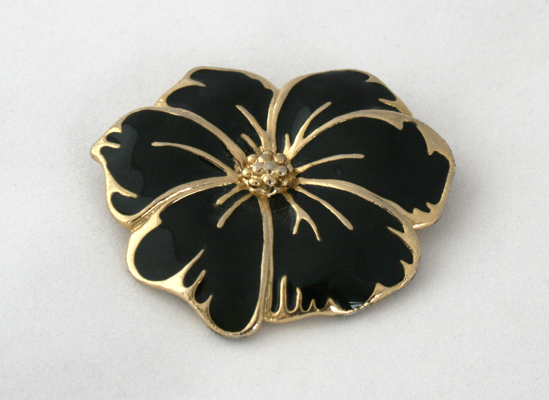 bloem broche zwart goud